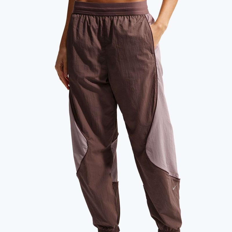 Дамски панталони за бягане Nike Swift UV Repel Mid-Rise tatoo/light violet ore 4
